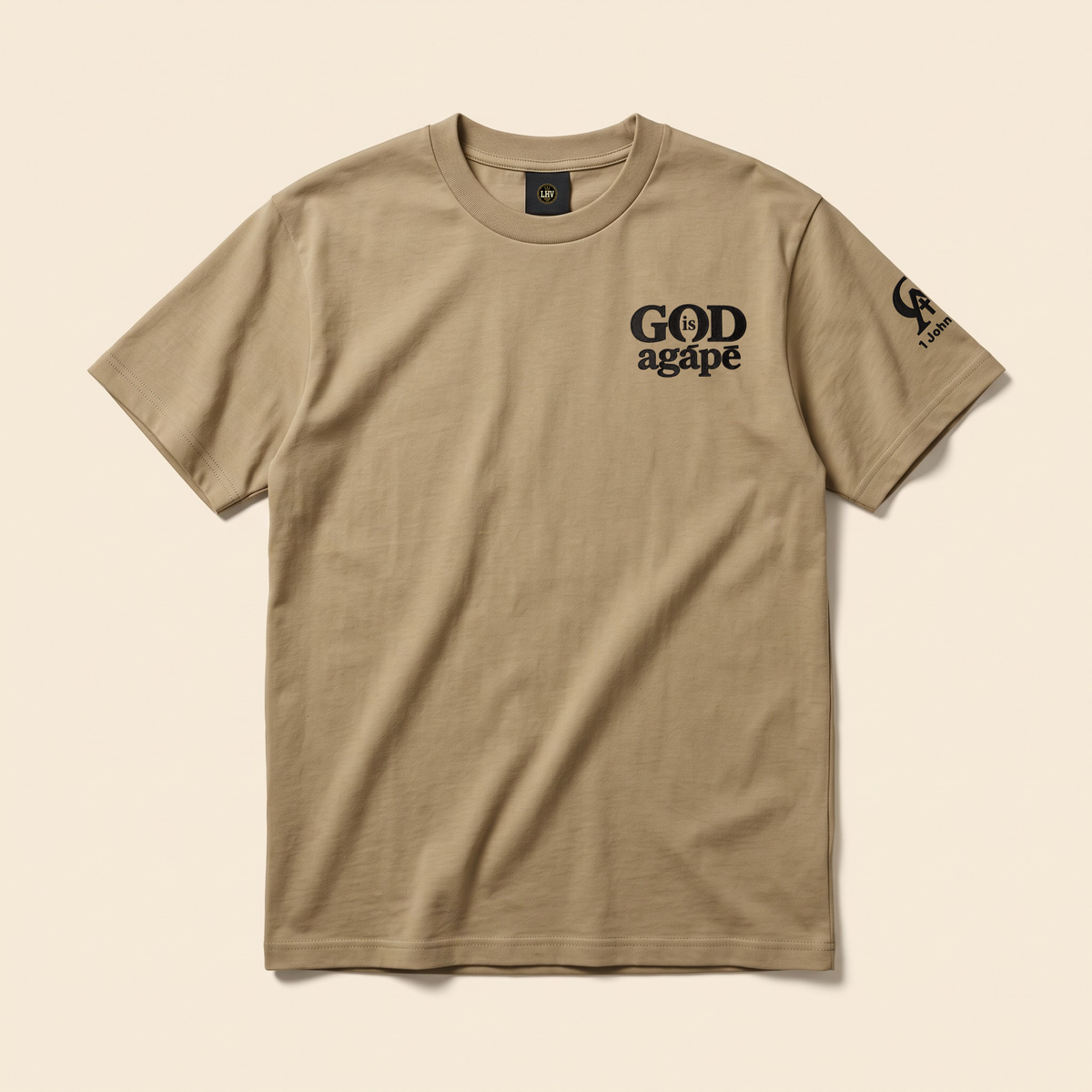 God Is Agápē — Standard Tee (Sand)