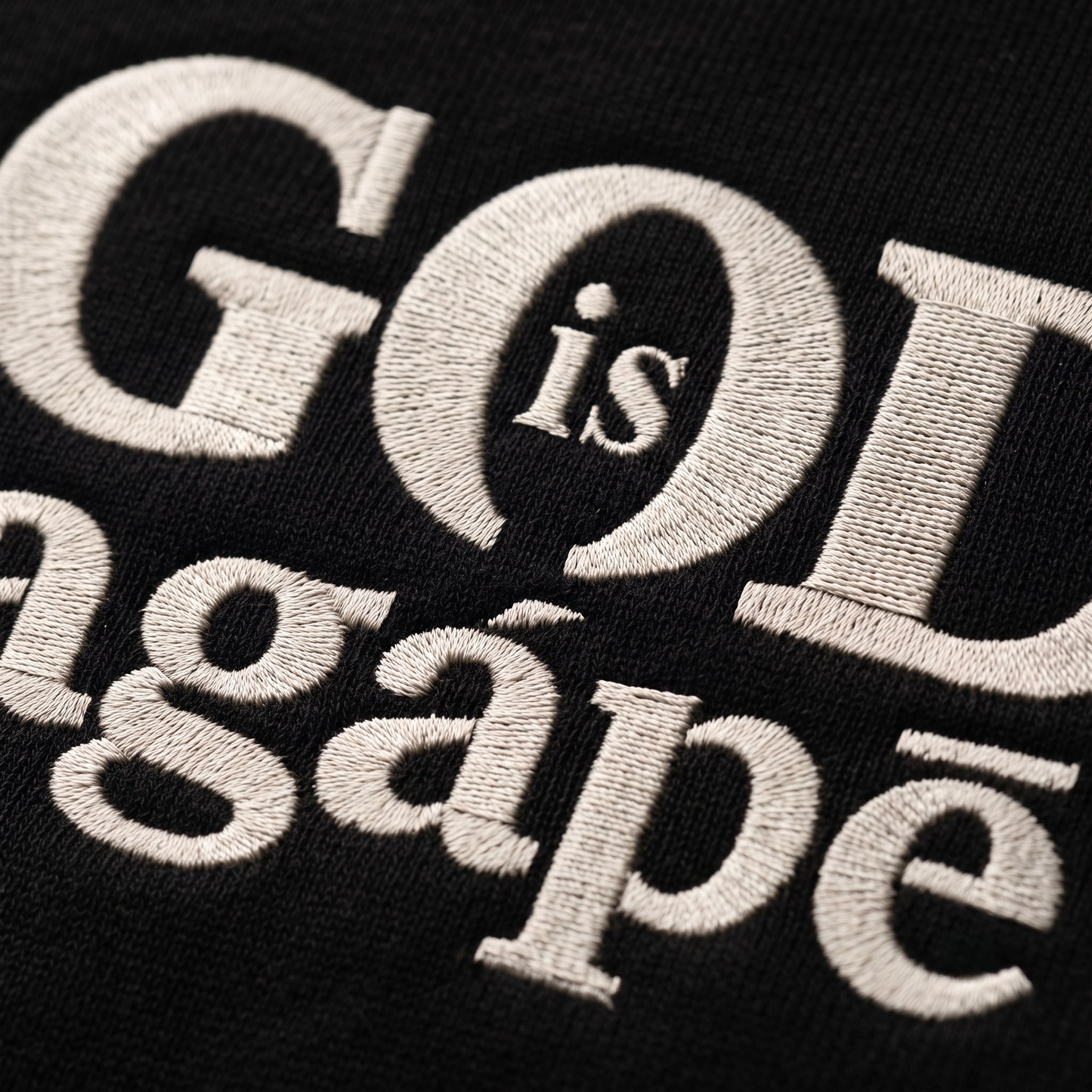 God Is Agápē — Steadfast Crew (Black)